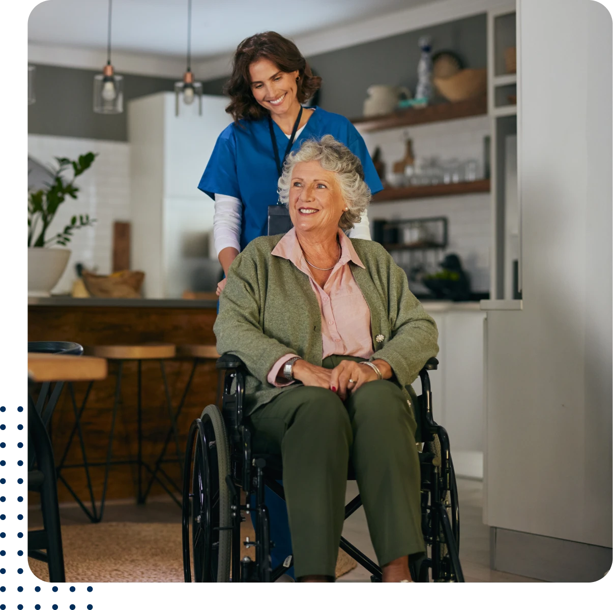 Nurse assisting elderly woman in wheelchair